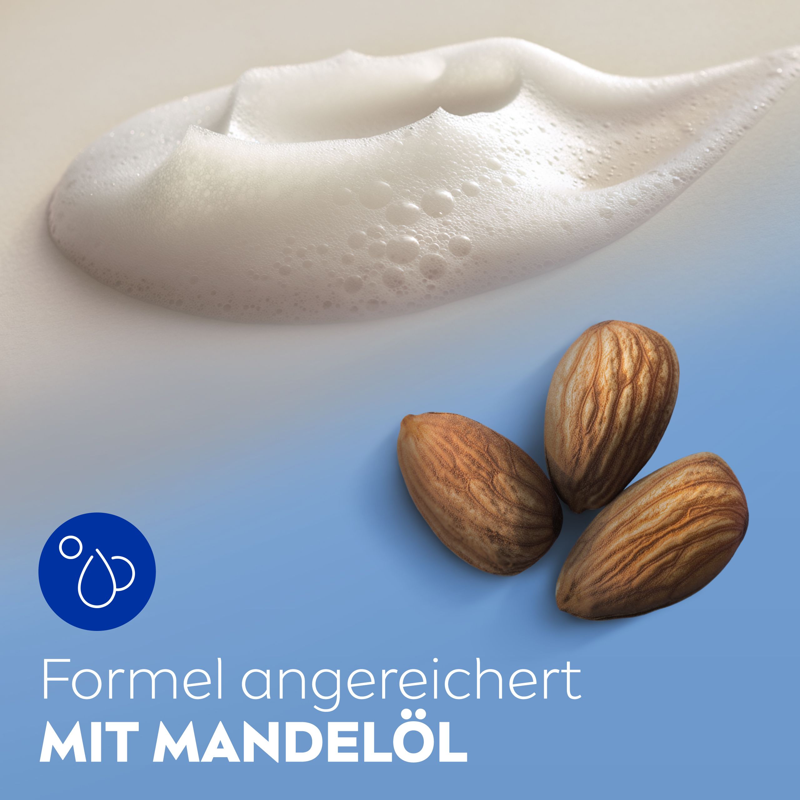 Mousse avec trois amandes et le texte "Formule enrichie À L'HUILE D'AMANDE".