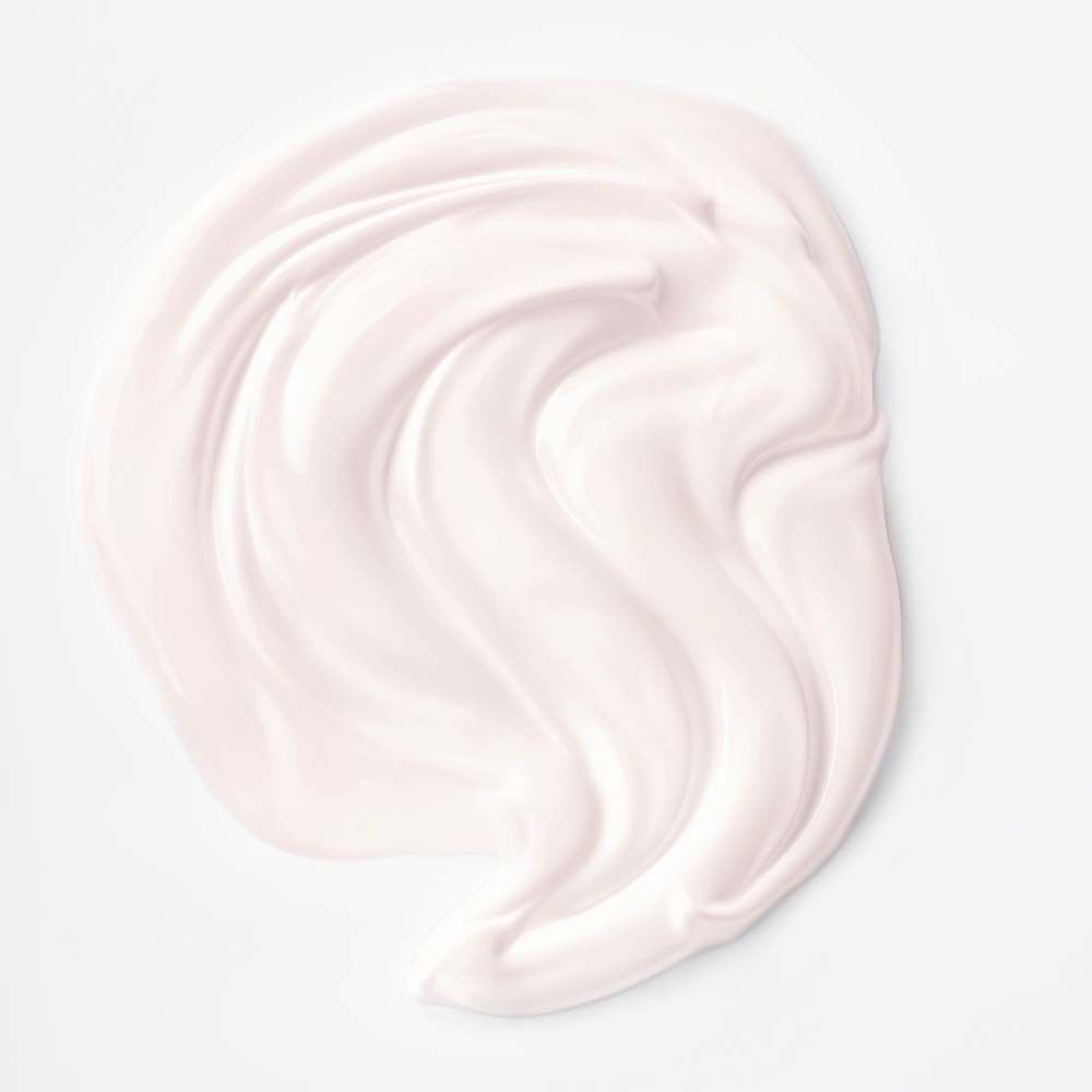 Tache de crème claire. Texture d'une crème. Sur fond clair.
