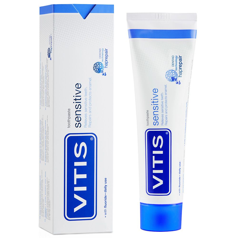 Tube et boîte de dentifrice. Tube blanc avec bouchon bleu. Boîte blanche avec logo bleu. Inscription : VITIS sensitive.