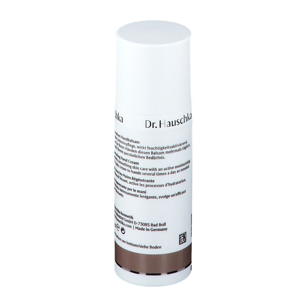 Tube blanc avec bouchon. Inscription et texte. Bande marron. Dos avec texte en plusieurs langues.