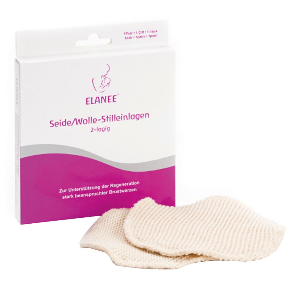 Coussinets d'allaitement ELANEE® en soie et laine, 2 épaisseurs. Deux coussinets à côté de l'emballage.