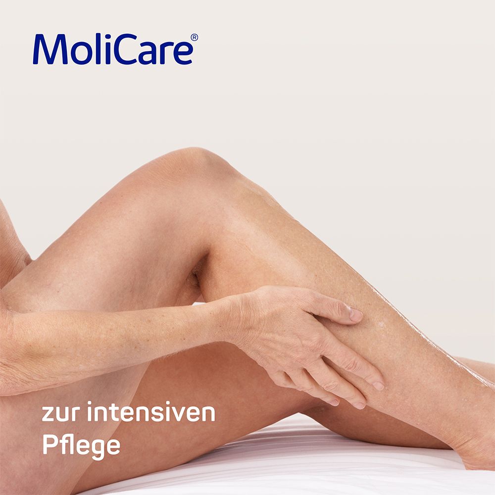 Jambes d'une personne appliquant de l'huile de soin. Texte : "pour soins intensifs".