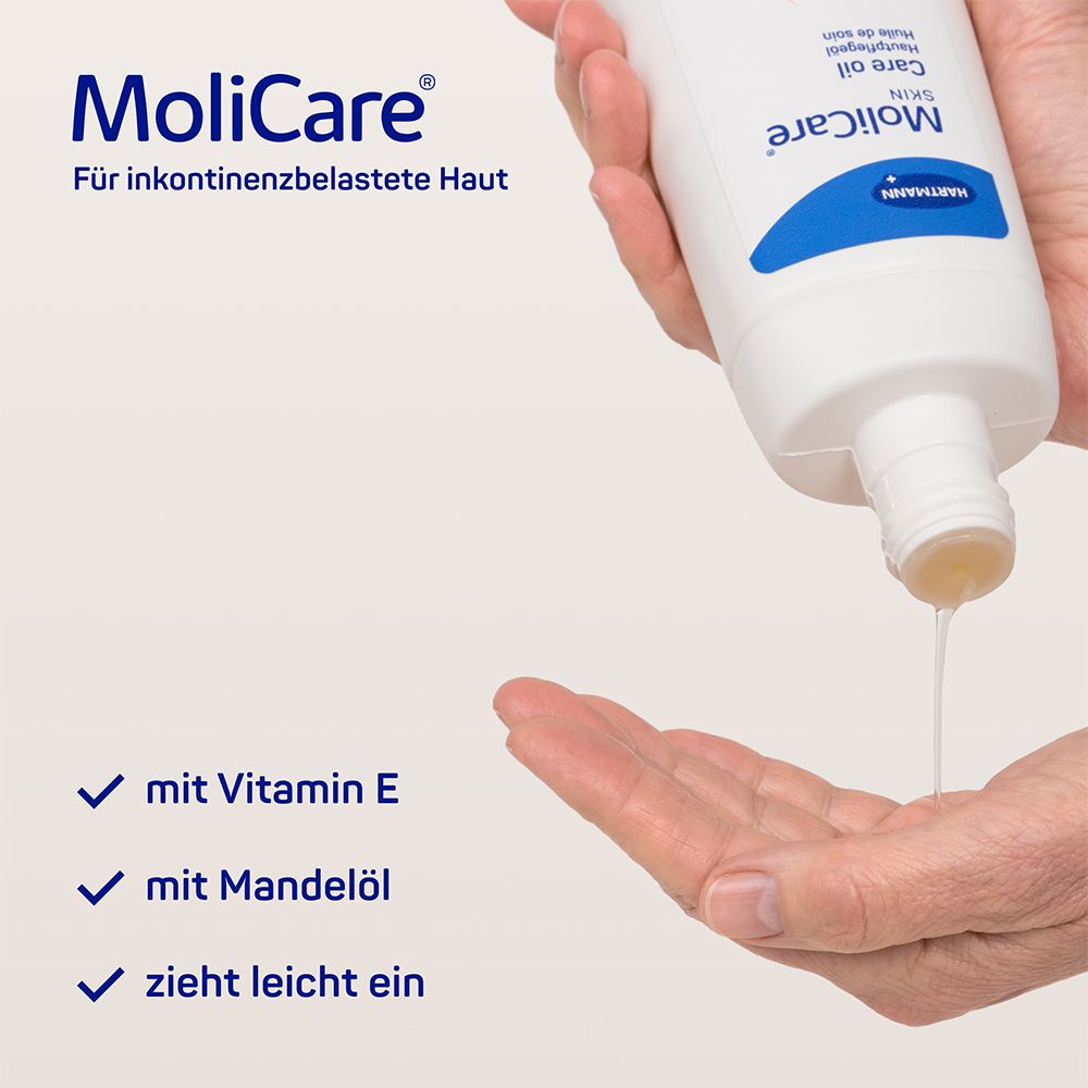 Mains tenant un flacon d'huile de soin MoliCare Skin. L'huile est versée dans la paume. Texte : "avec vitamine E", "avec huile d'amande", "pénètre facilement".