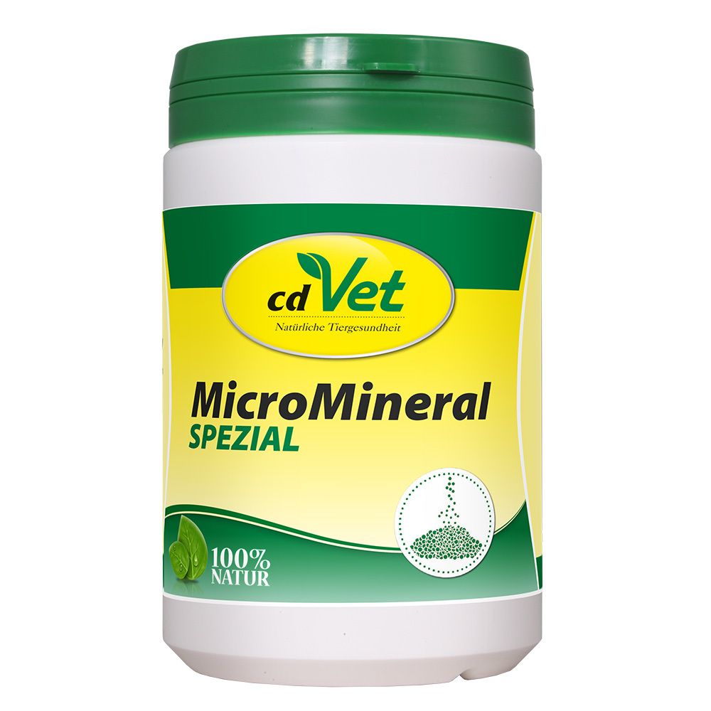 Boîte blanche avec couvercle vert. Inscription : cdVet MicroMineral SPEZIAL. Logo et feuilles vertes.