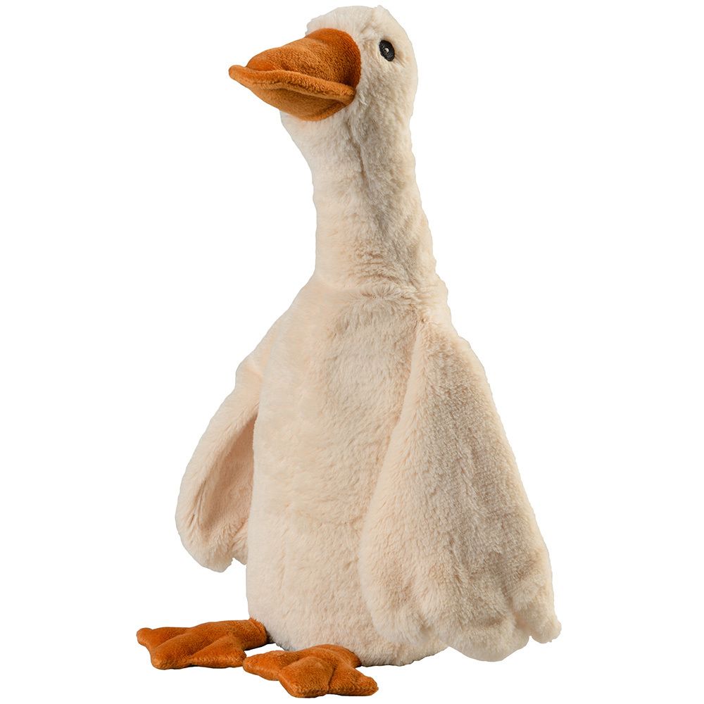 Oie en peluche beige avec bec et pieds orange. Debout, regardant vers la droite.