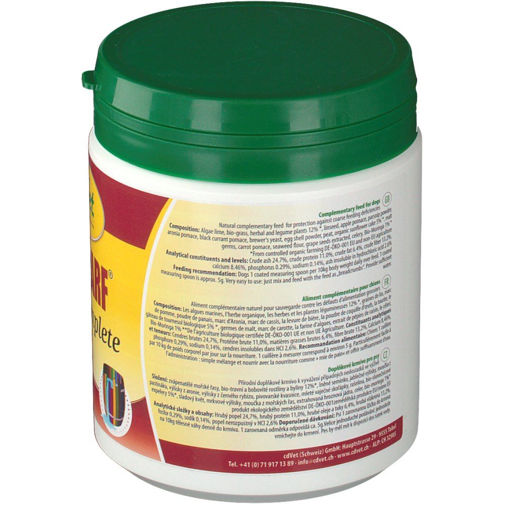 Récipient blanc avec couvercle vert. Texte : Aliment complémentaire pour chiens. Composition, constituants analytiques, recommandation d'alimentation.