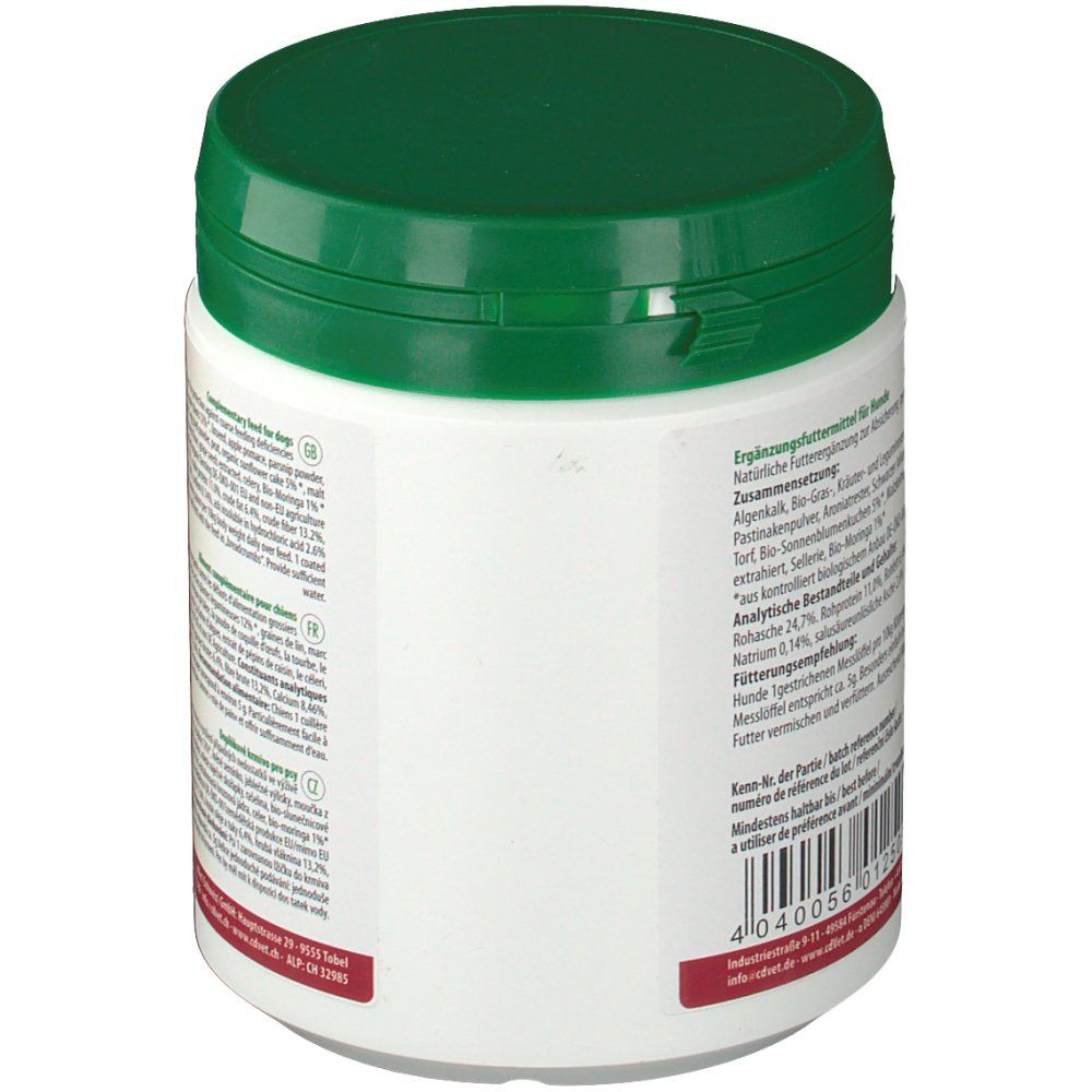 Récipient blanc avec couvercle vert. Texte : Aliment complémentaire pour chiens. Composition, constituants analytiques, recommandation d'alimentation.