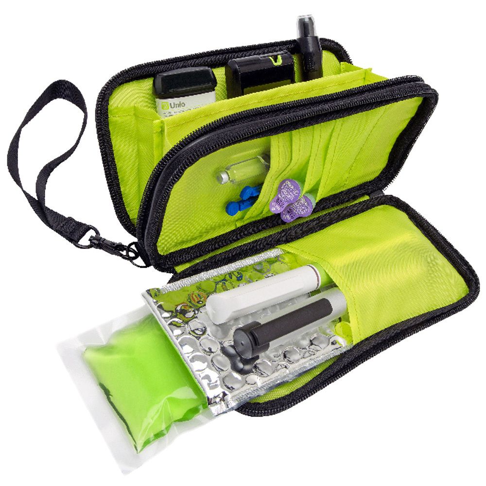 Trousse verte zippée contenant des dispositifs médicaux. Comprend des ampoules, des stylos et des accessoires. Poignée noire.