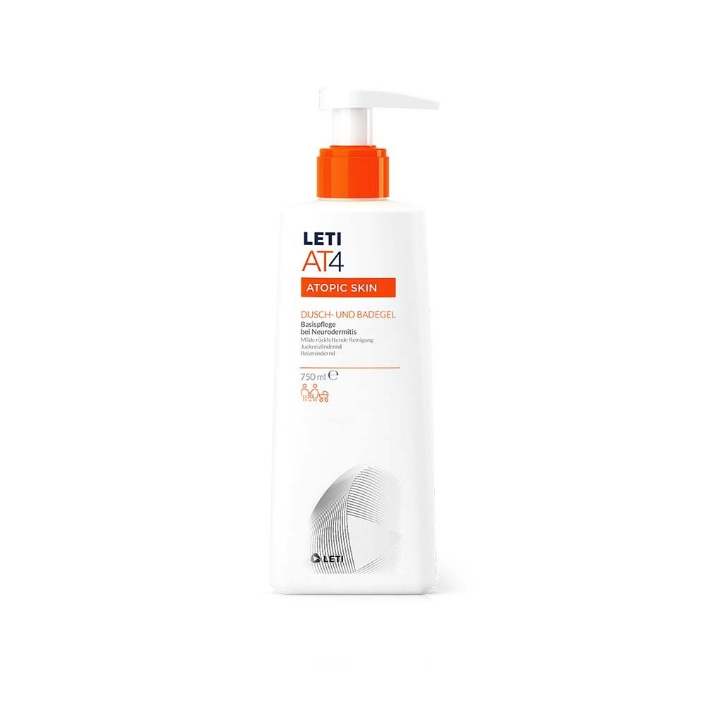Gel douche et bain LETI AT4 blanc avec pompe. Accent orange. Texte : ATOPIC SKIN.