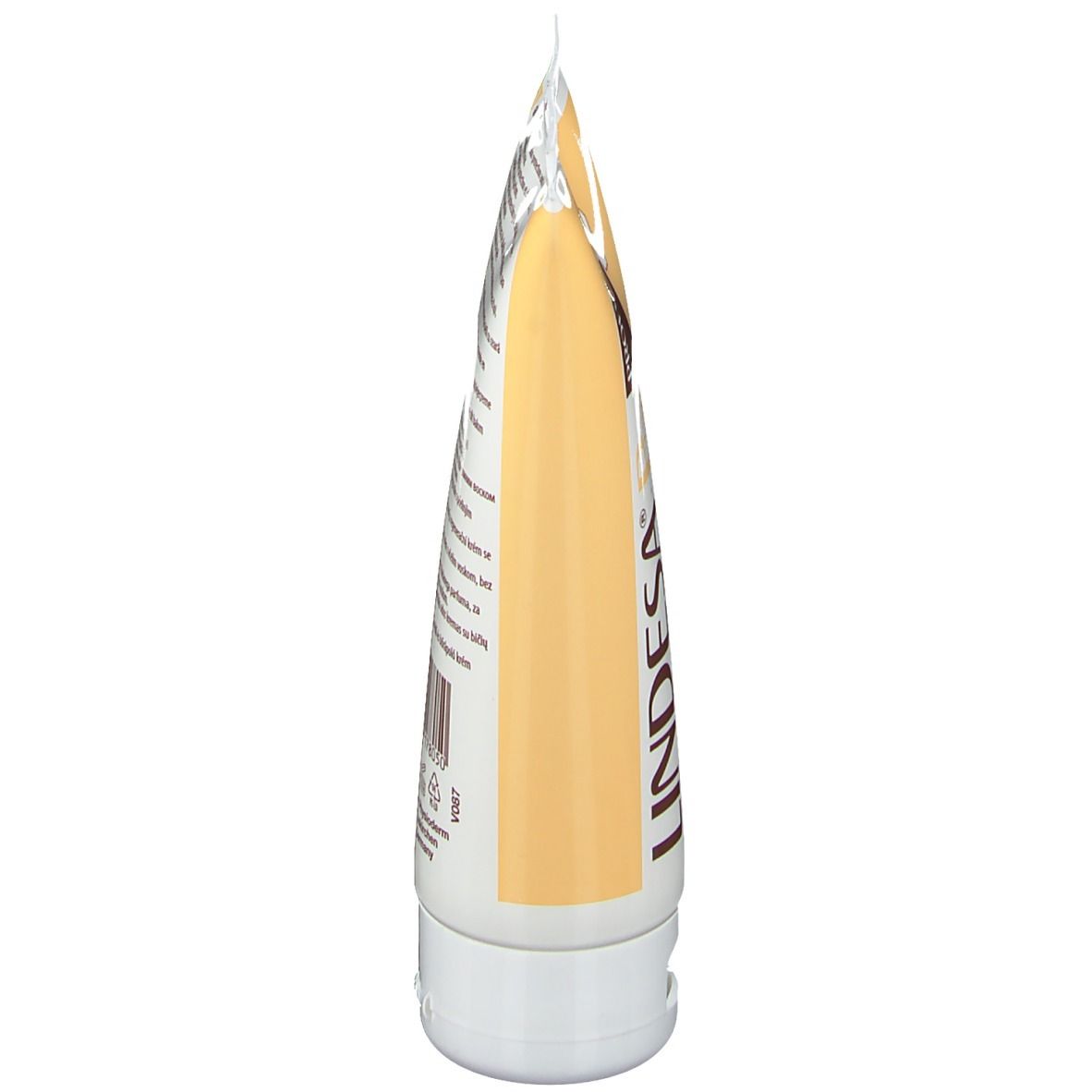 Vue latérale du tube de crème LINDESA® Pure. Tube jaune et blanc, forme arrondie. Inscription : LINDESA® Pure.