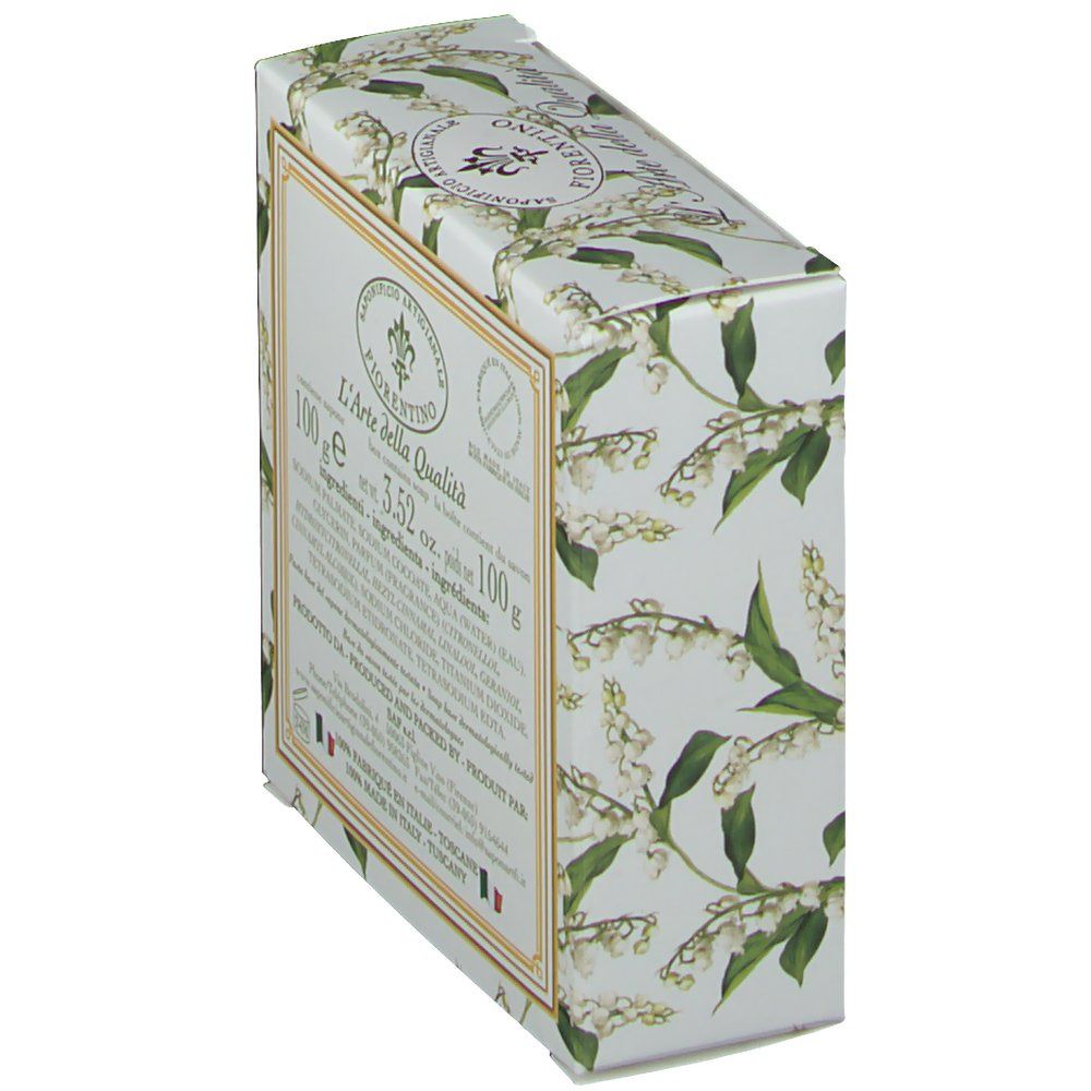 Boîte en carton inclinée avec motif de muguet. Inscription : L'Arte della Qualità. Ingrédients et informations du fabricant.