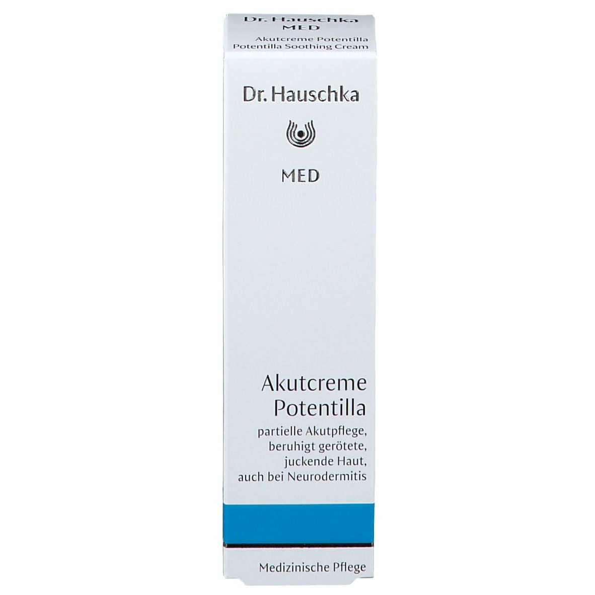 Boîte blanche avec texte bleu. Inscription: Dr. Hauschka MED, Akutcreme Potentilla, Soins médicaux.