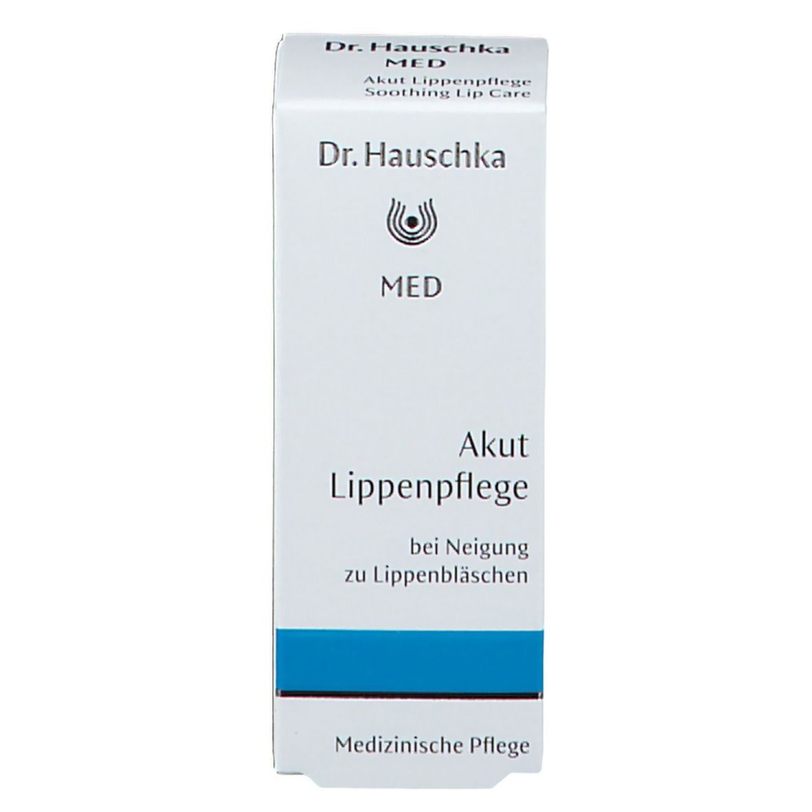 Boîte blanche. Inscriptions: Dr. Hauschka, MED, Akut Lippenpflege. Accents bleus. Texte: Medizinische Pflege.