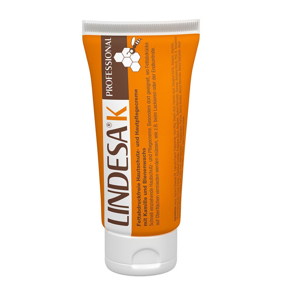 Tube orange avec bouchon blanc. Inscription : LINDESA K PROFESSIONAL. Texte et logo.