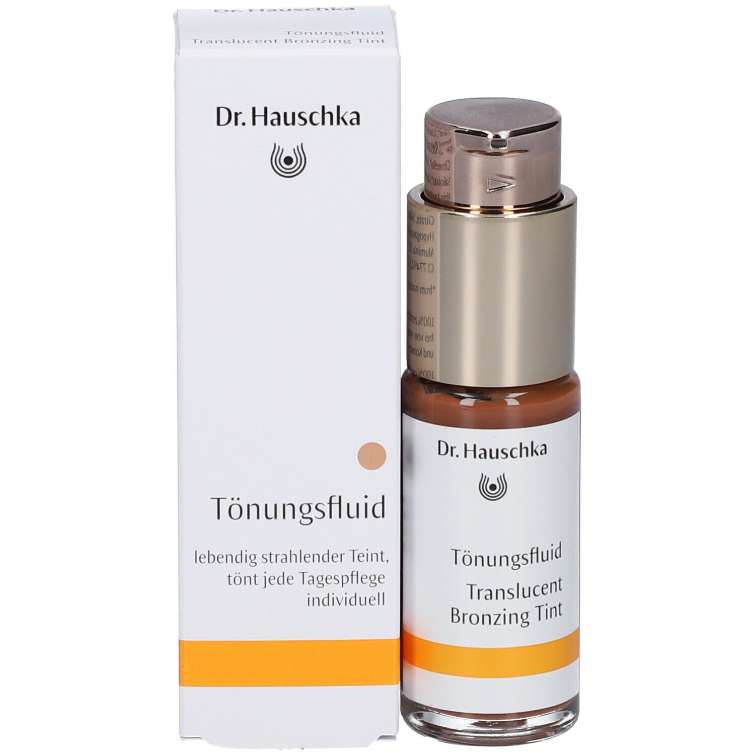 Fluide teinté et emballage. Inscription : Dr. Hauschka, Tönungsfluid, lebendig strahlender Teint, tont jede Tagespflege individuell.