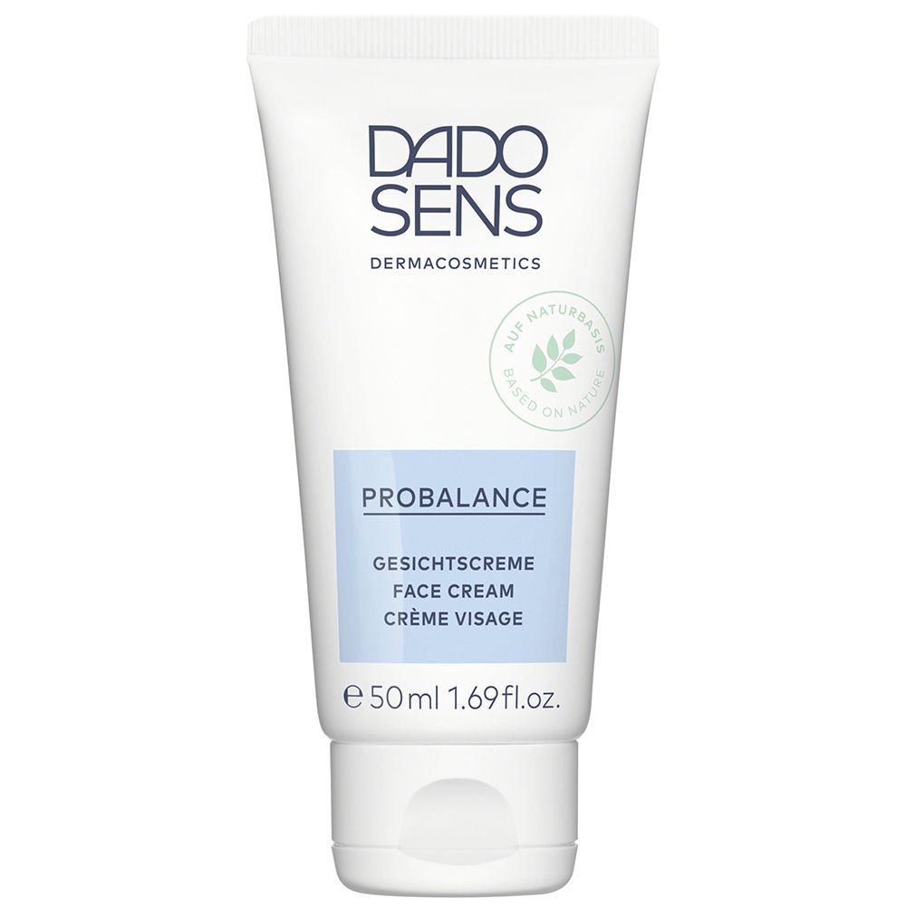 Tube blanc avec texte bleu. Contient une crème visage. Marque : DADO SENS PROBALANCE.