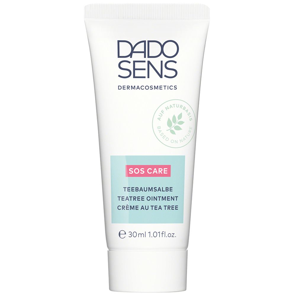 Tube blanche DADO SENS SOS CARE. Inscription: Teebaumsalbe, 30ml. Contient un logo de feuille.