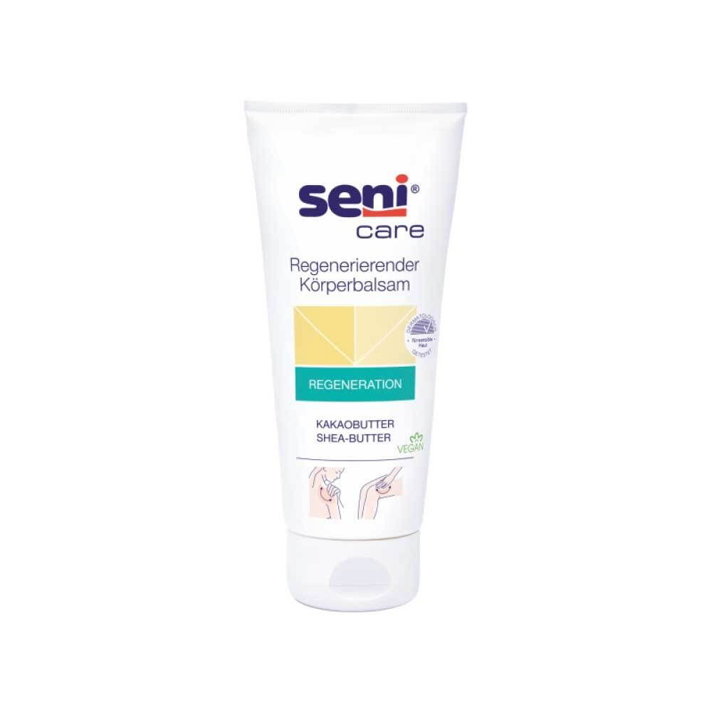 Tube blanche seni® care. Texte: Baume corporel régénérant, Régénération, Beurre de cacao, Beurre de karité. Label vegan.