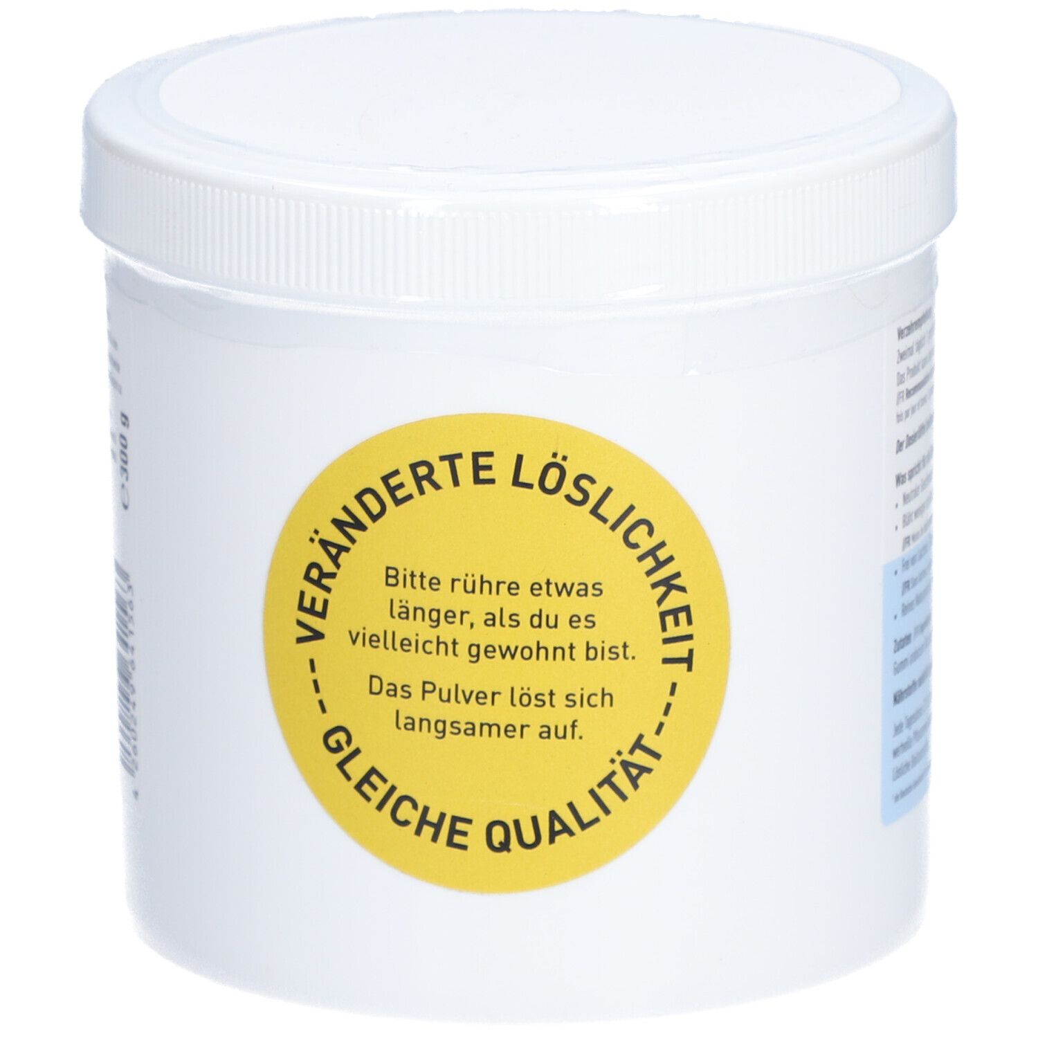 Récipient blanc avec couvercle. Autocollant jaune : Solubilité modifiée, même qualité. Texte.