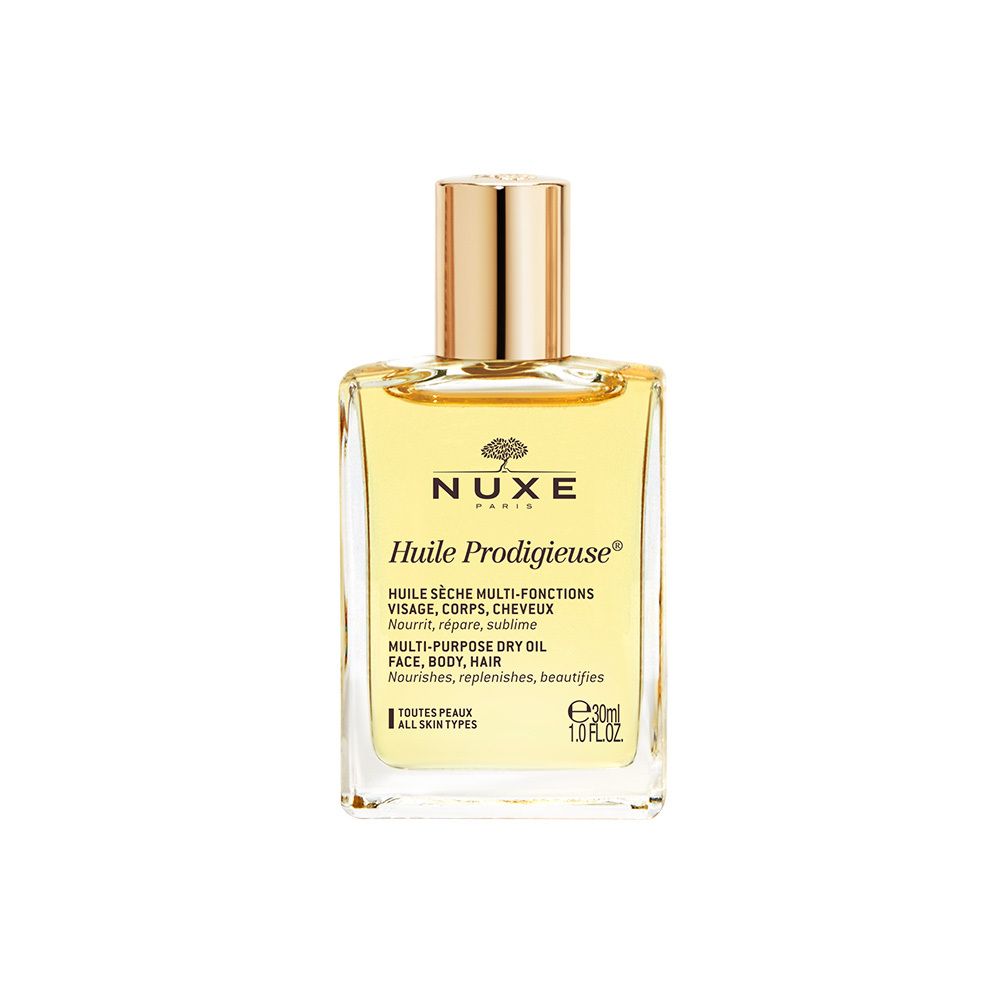 Huile Prodigieuse® 30 ml NUXE. Huile sèche multi-fonctions pour visage, corps, cheveux. Flacon en verre transparent, bouchon doré.