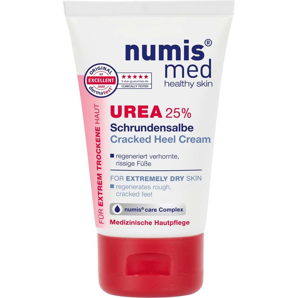 Tube de crème avec bouchon rouge. Inscription : numis med UREA 25% Schrundensalbe. Label Dermatest.