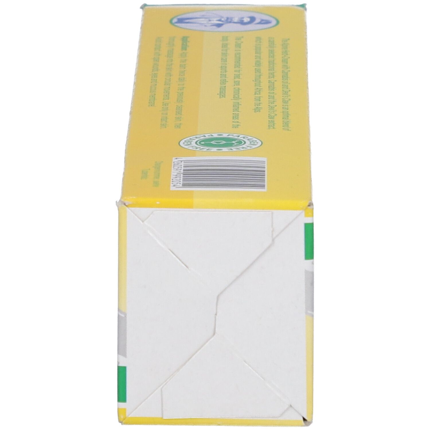Boîte jaune de crème Alpenkräuter. Inscription : Alpenkräuter-Creme. Bande verte et logo.