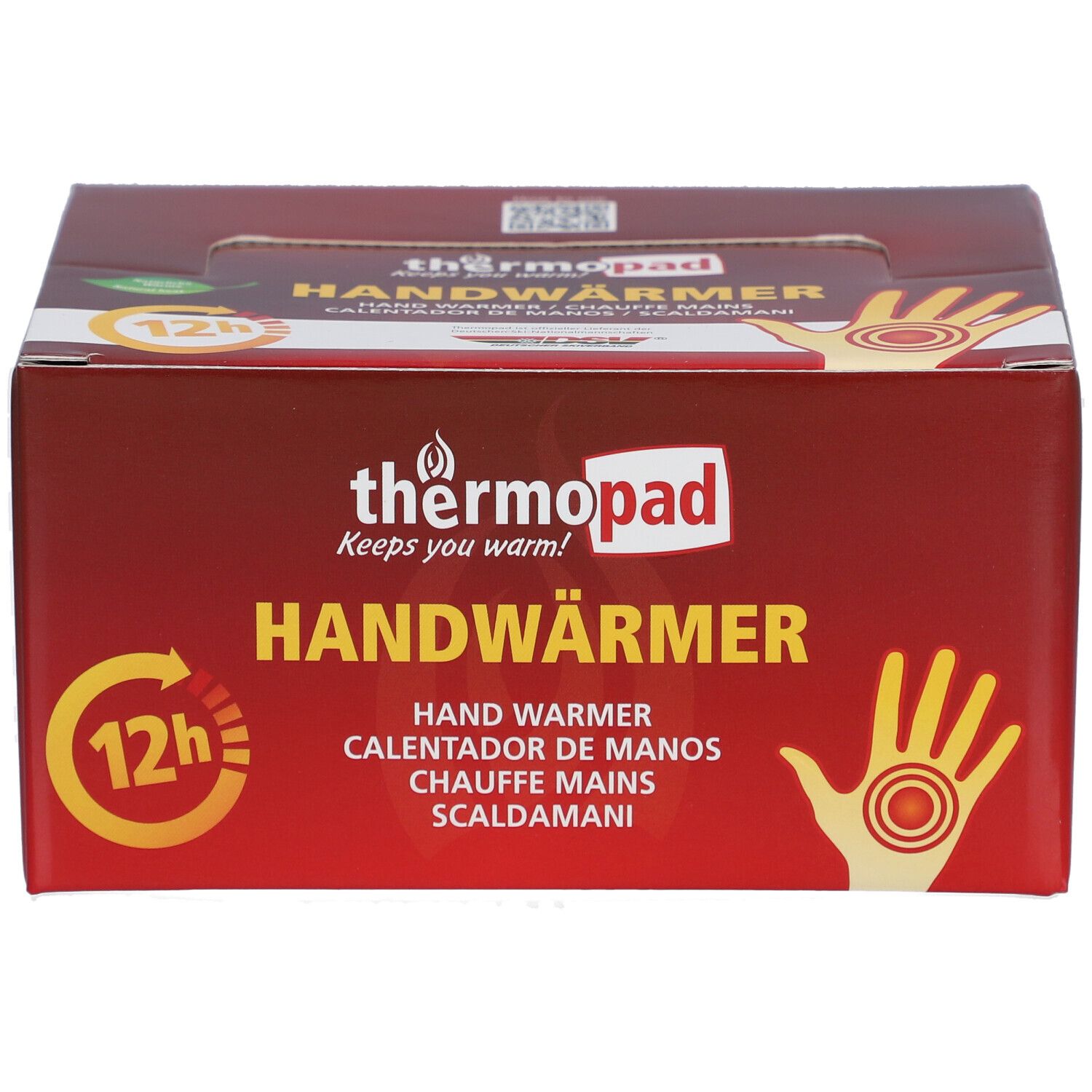 Boîte de thermopad® Handwärmer. Rouge, avec nom du produit, illustration de main et symbole 12h.