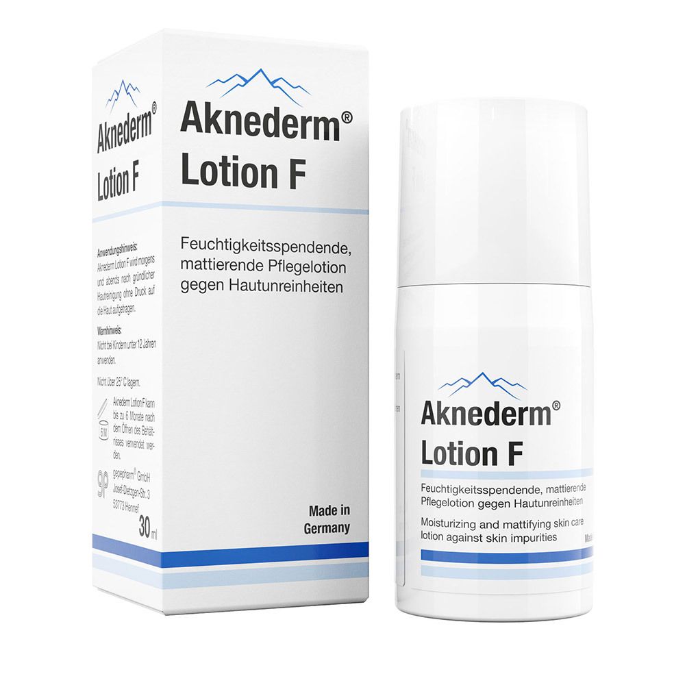 Aknederm® Lotion F, flacon et emballage. Flacon blanc avec anneau bleu. Texte: Soin hydratant, matifiant.