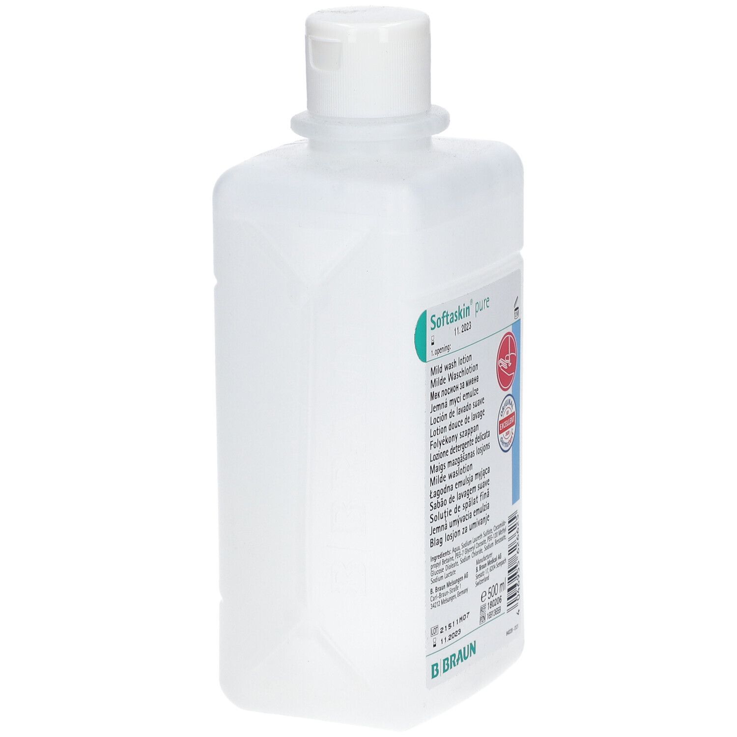 Flacon blanchâtre, légèrement incliné. Étiquette verte avec Softaskin pure et texte. Sceau rouge et logo B. Braun. 500 ml.