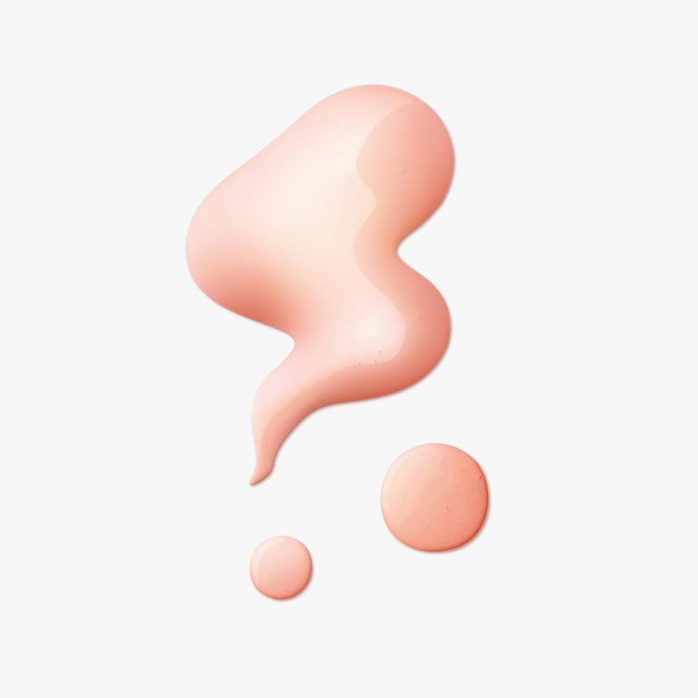 Gouttes de liquide rose. Trois gouttes de différentes tailles sur fond blanc.