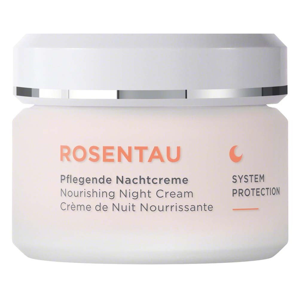 Pot de crème avec couvercle blanc. Texte: ROSENTAU, Pflegende Nachtcreme, Nourishing Night Cream, Crème de Nuit Nourrissante.