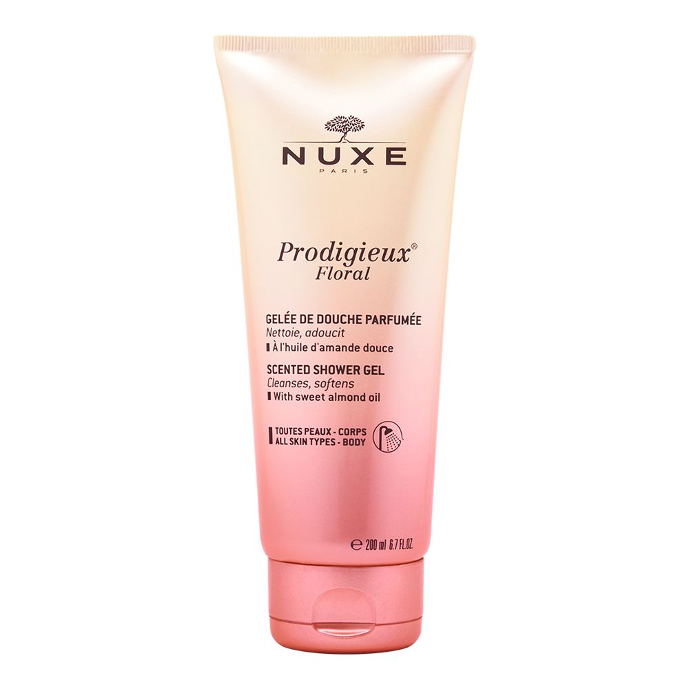 Gel douche NUXE Prodigieux Floral. Tube dégradé rose. Nom du produit et marque visibles.