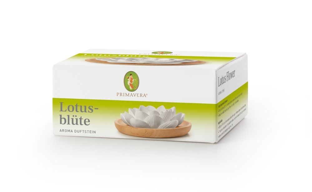 Pierre olfactive Lotusblüte dans son emballage. Pierre blanche en forme de fleur de lotus. Logo Primavera.