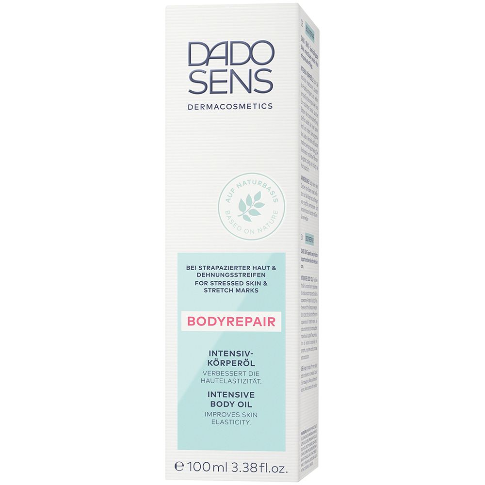 DADO SENS BODYREPAIR Huile Corps Intense dans son emballage. Inscription: BODYREPAIR, Huile corporelle intense, pour les vergetures.