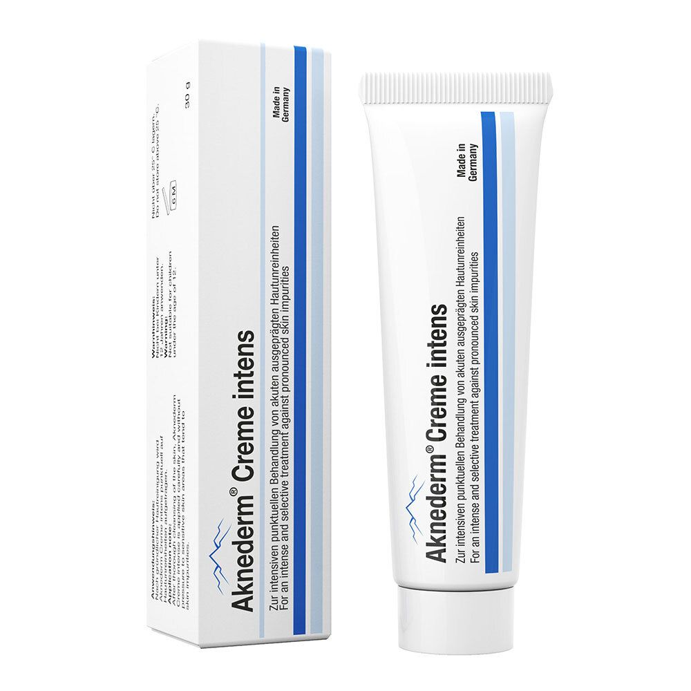 Tube et emballage Aknederm Creme intens. Blanc, accents bleus. Texte: Creme intens, Made in Germany.