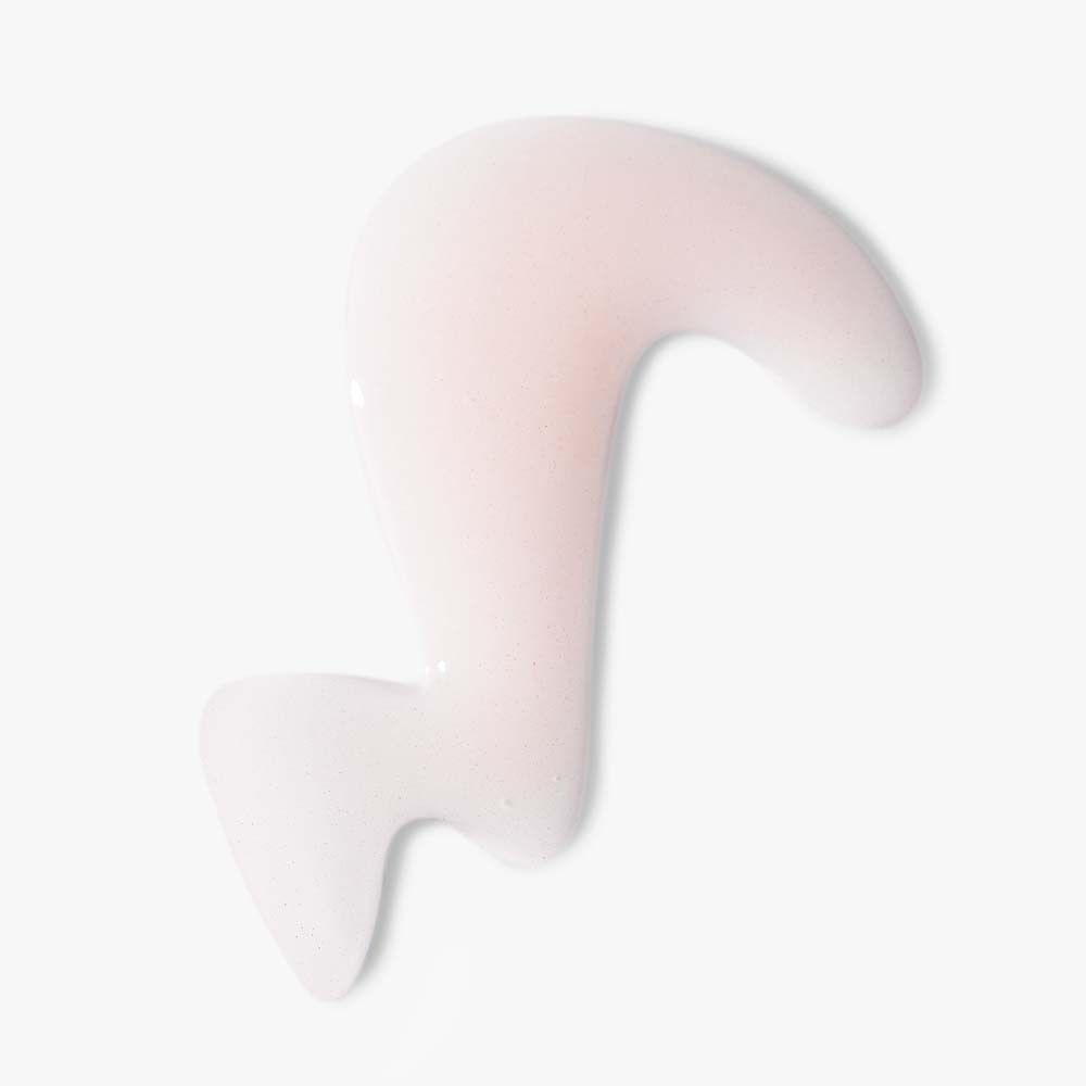 Liquide. Liquide rose sur fond blanc. Forme : en forme de vague.