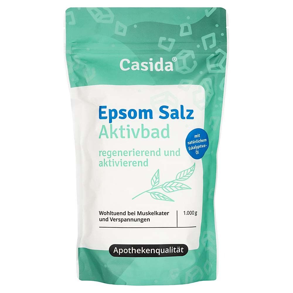 Sachet de sels de bain Epsom Aktivbad. Emballage vert et blanc avec nom et ingrédients. Qualité pharmaceutique.