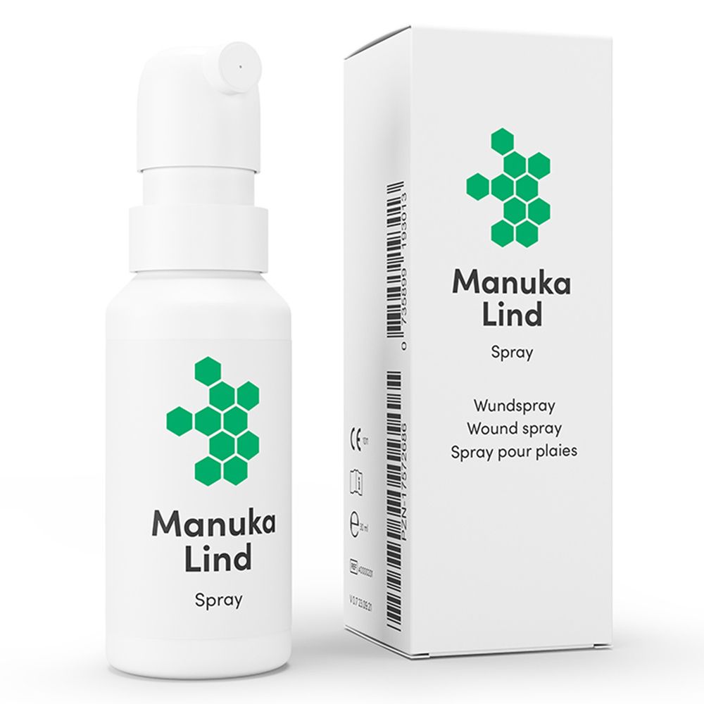Flacon pulvérisateur blanc et boîte avec logo vert et texte Manuka Lind Spray. Emballage avec indications de spray pour plaies.