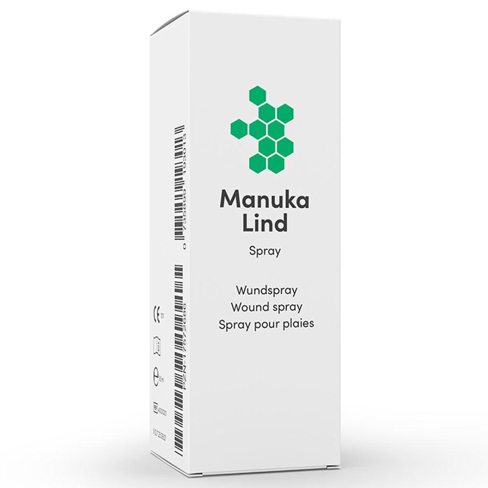 Boîte avec logo vert et texte Manuka Lind Spray. Texte: Wundspray, Wound spray, Spray pour plaies. Fond blanc.