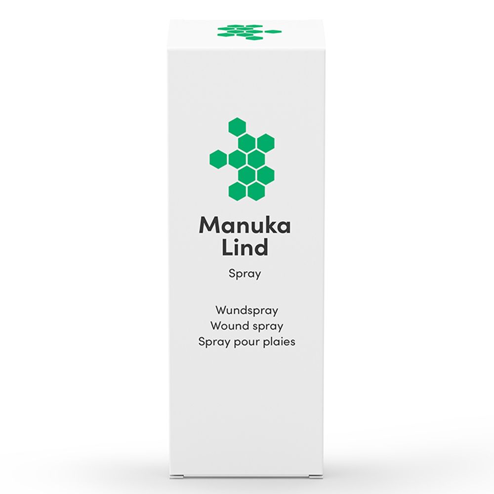 Boîte avec logo vert et texte Manuka Lind Spray. Texte: Wundspray, Wound spray, Spray pour plaies. Fond blanc.