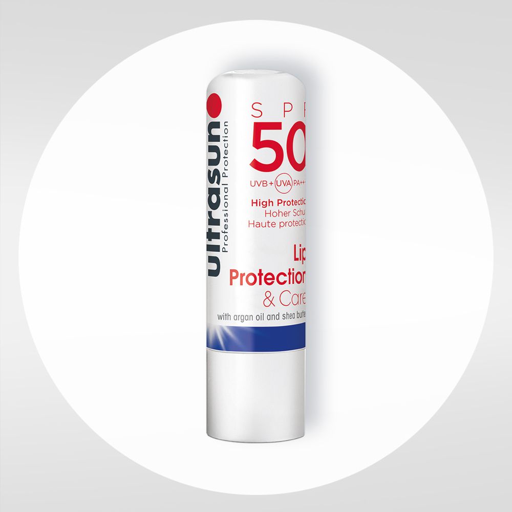 Stick de protection lèvres blanc. Texte rouge: SPF 50, Lip Protection & Care. Avec huile d'argan et beurre de karité.