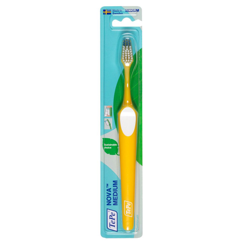 Brosse à dents jaune avec poils bleu-gris, emballée. Manche avec insert blanc. Inscriptions "NOVA MEDIUM" et "TePe".