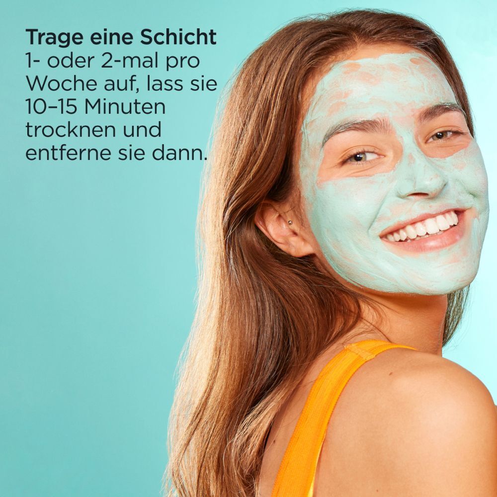 Femme avec masque sur le visage. Texte : Appliquer une couche 1 à 2 fois par semaine, laisser sécher 10-15 minutes, puis rincer.