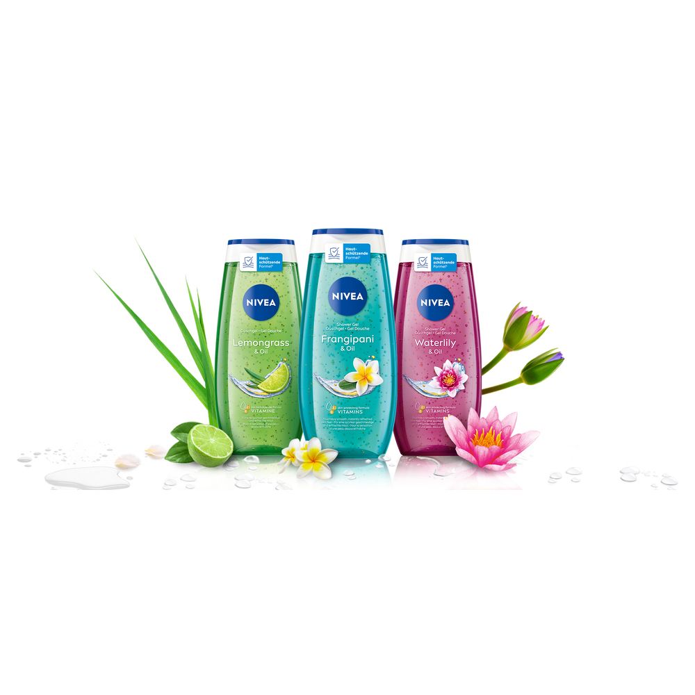 Trois douches soin NIVEA : Frangipani & Oil, Lemongrass & Lime, Waterlily. Présentées avec fleurs et fruits assortis.