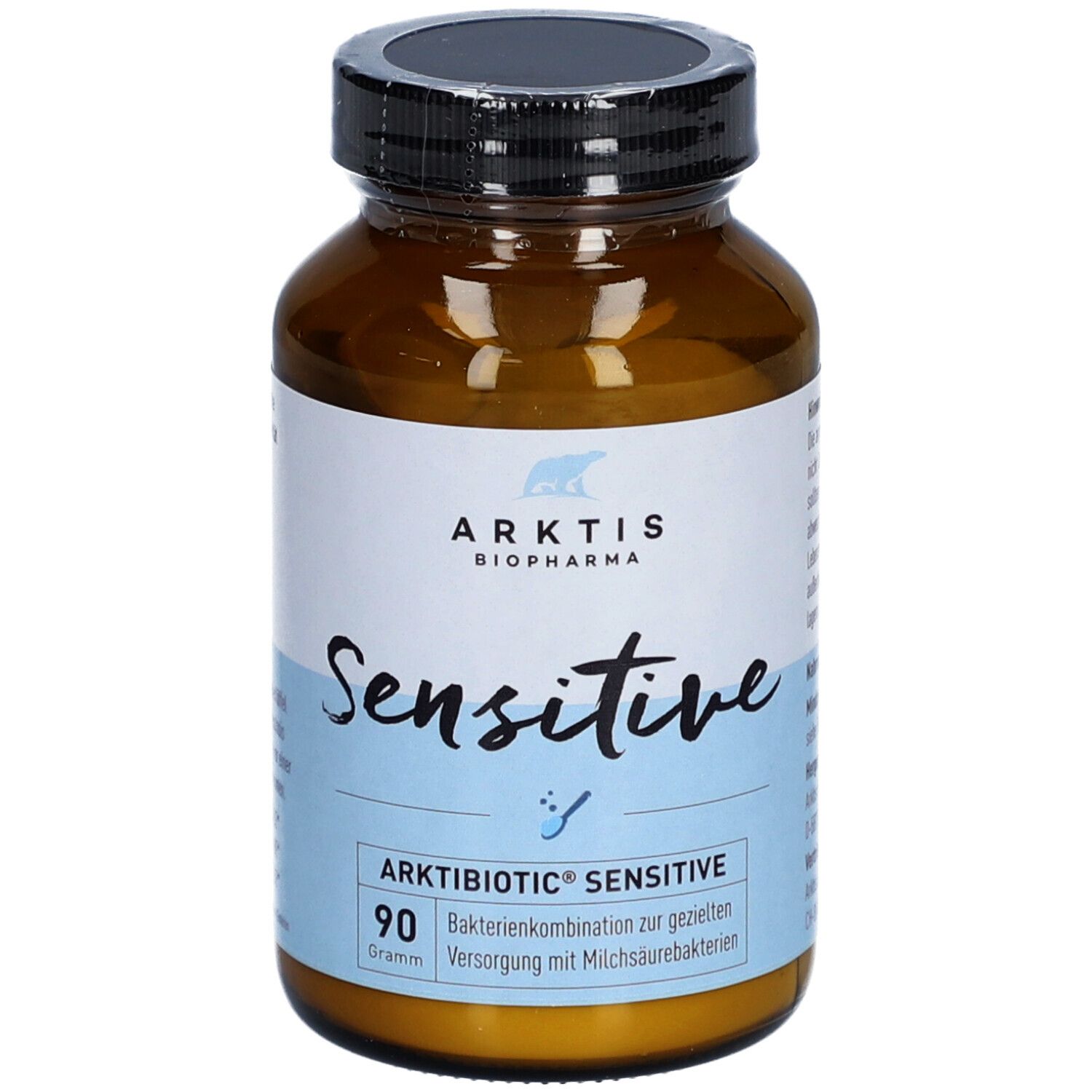 Flacon en verre brun avec bouchon noir. Étiquette avec "ARKTIS", "Sensitive" et "90 grammes".