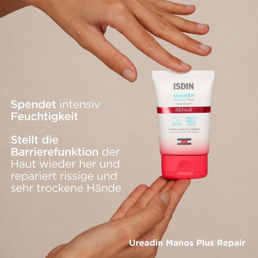 Mains tenant un tube ISDIN Ureadin Manos Plus Repair. Texte : Hydrate intensément, répare les mains gercées.