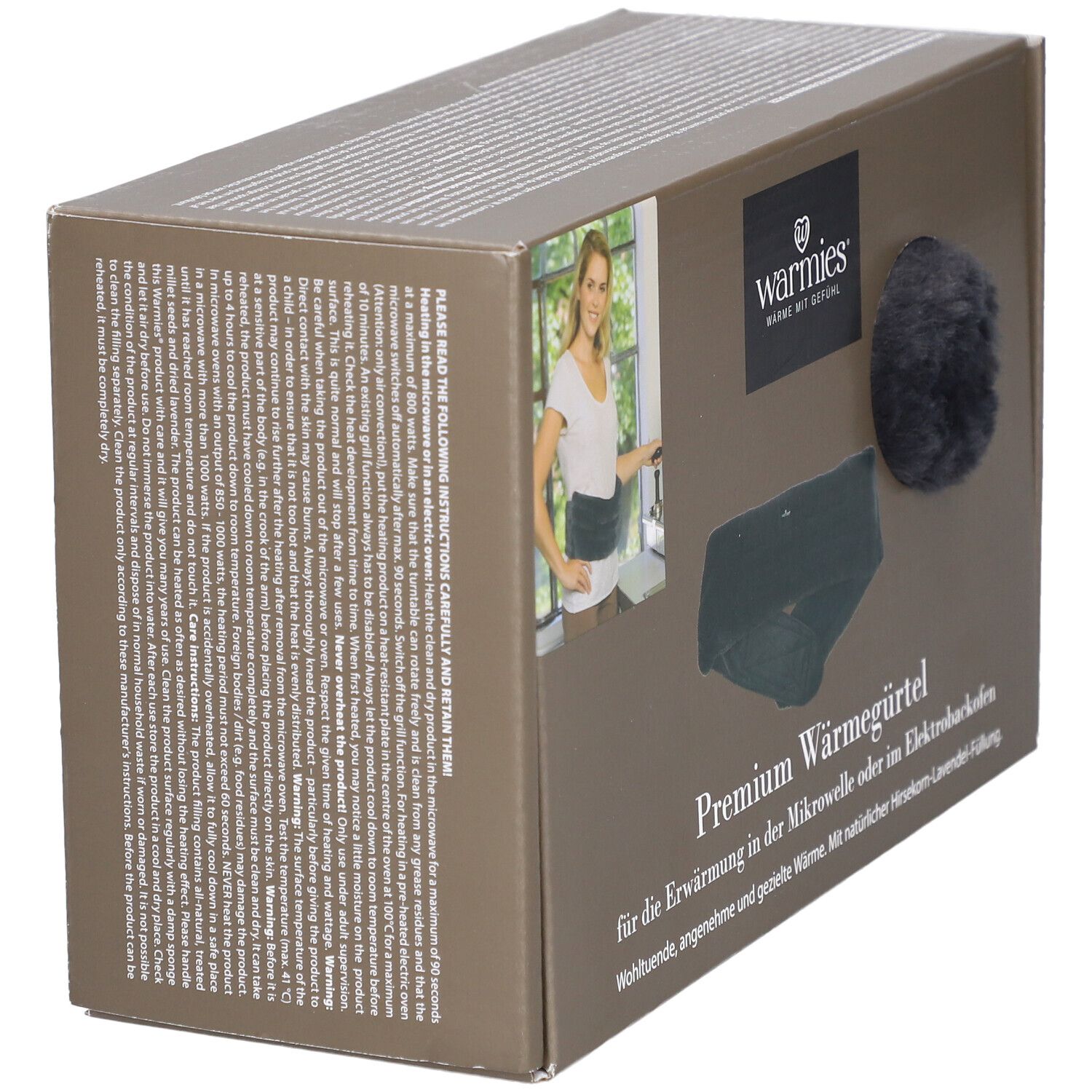 Boîte avec texte et image du produit. Logo : Warmies. Produit : Premium Wärmegürtel. Image d'une femme avec la ceinture.