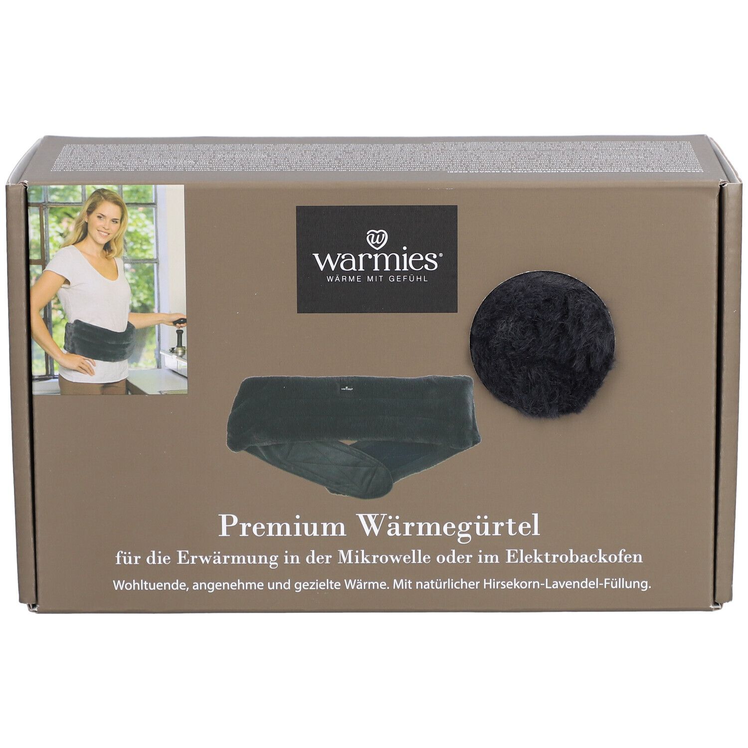 Boîte avec image du produit et texte. Logo : Warmies. Produit : Premium Wärmegürtel. Image d'une femme avec la ceinture.