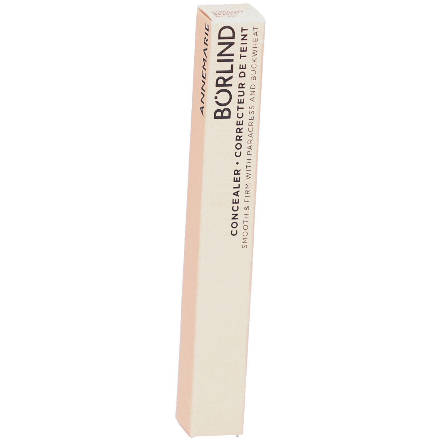Emballage fin beige. Inscription: ANNEMARIE BÖRLIND. Correcteur de teint. Contient paracress et sarrasin.