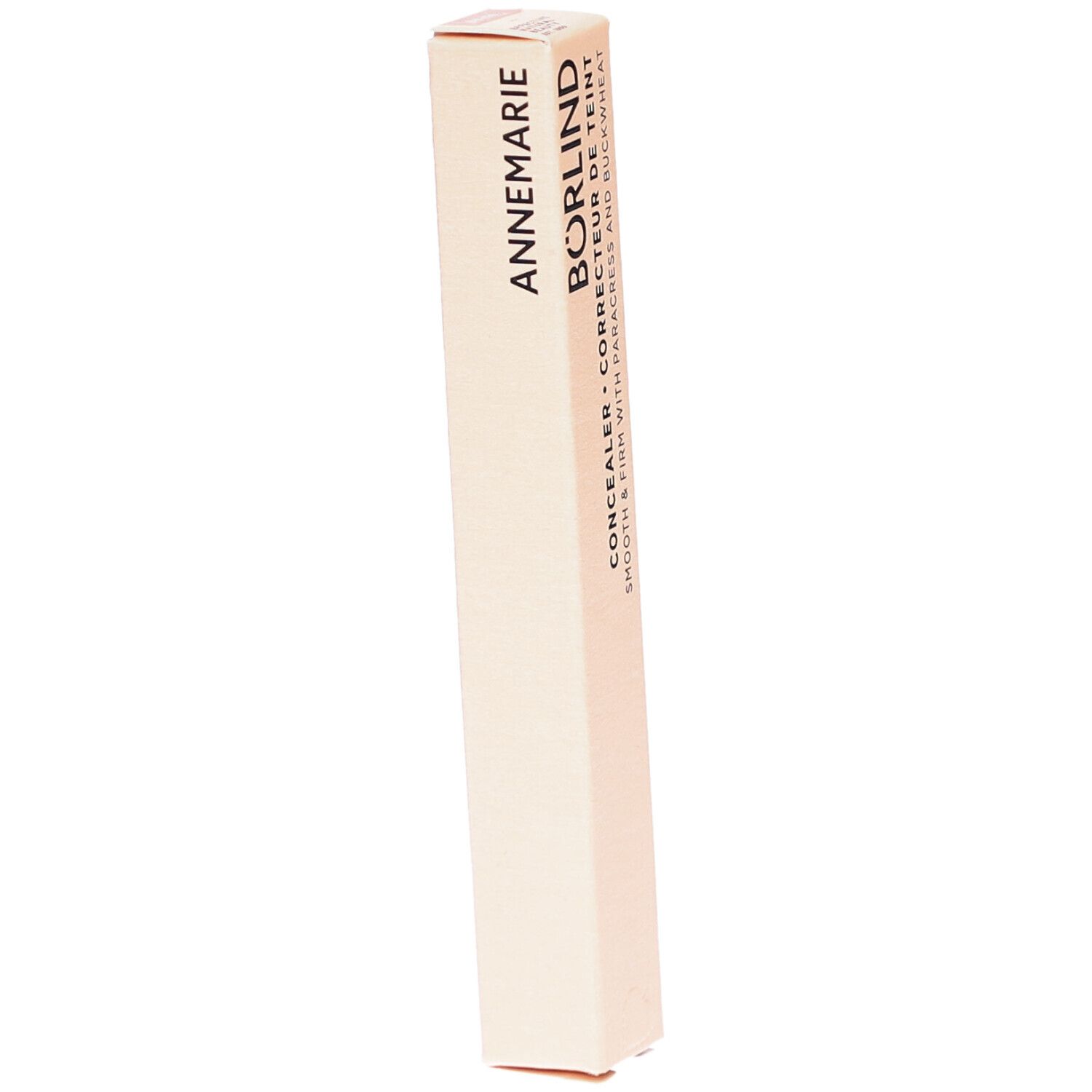 Emballage de correcteur BÖRLIND. Boîte beige allongée. Inscription : ANNEMARIE BÖRLIND, Concealer, Correcteur de teint.